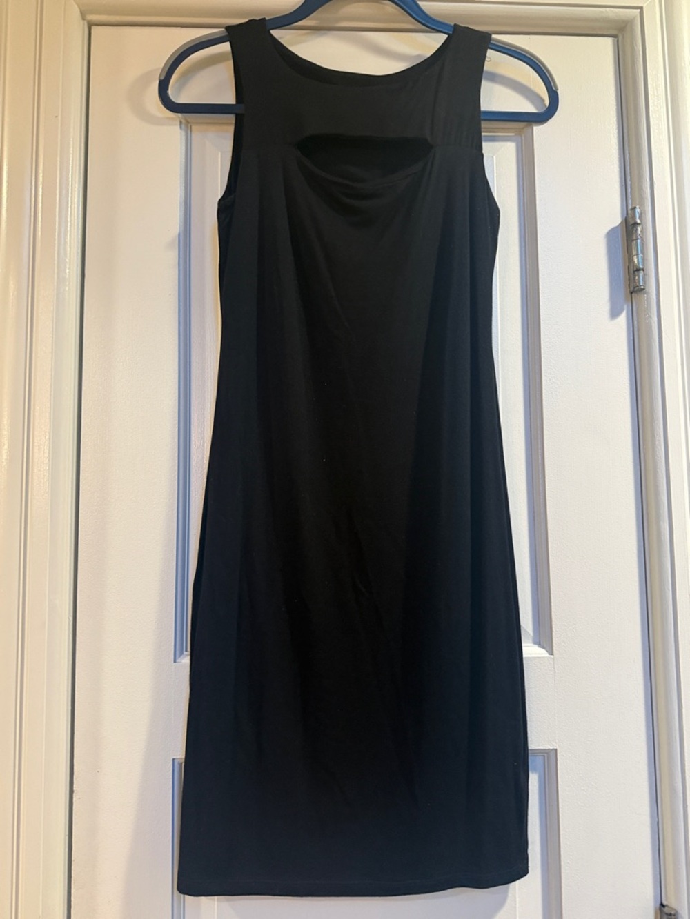 Classic LBD black sleeveless dress.